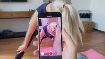 She likes to do yoga at home and her boyfriend films her when she bends down